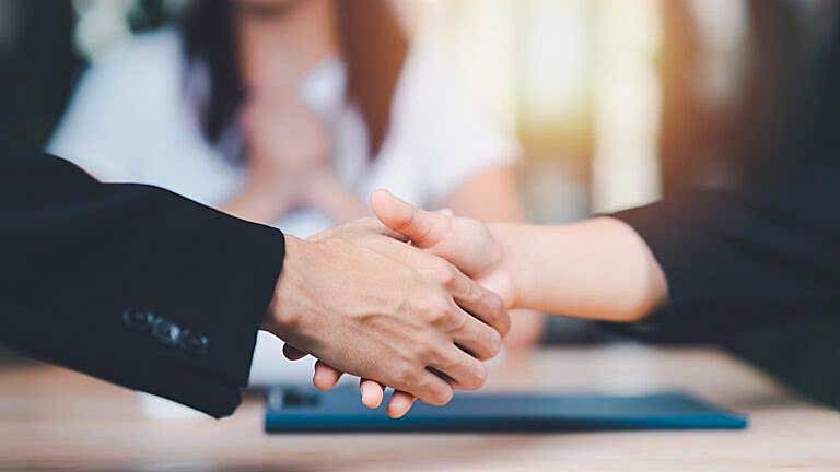 Businessmen shaking hands to indicate a business deal ,successfu